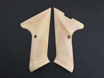 High Standard Supermatic, Field-King, or Sport King Models Thumbrest Bonded Ivory (<i>Discoloration as Pictured</i>) Checkered with Logo<br>(Retail Price: $78)